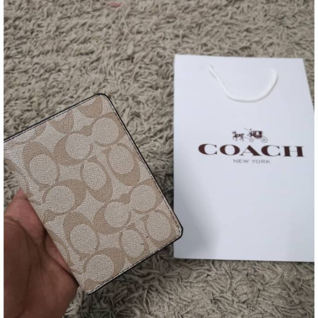 Coach on sale passport bag