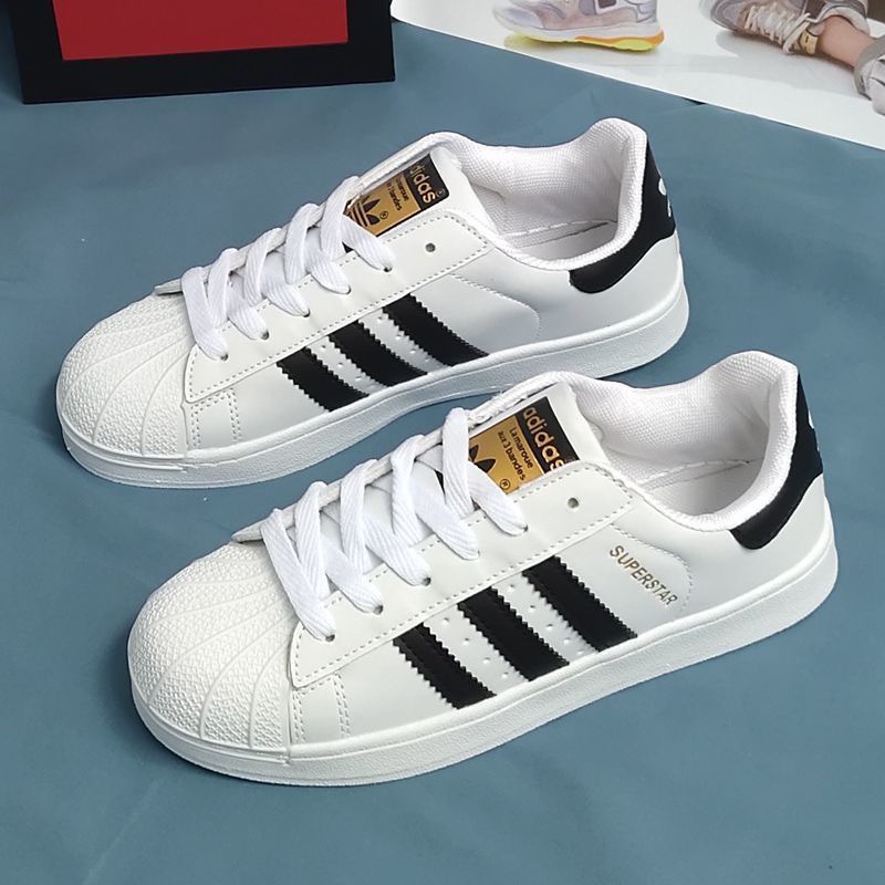 Adidas superstar hotsell white silver 38