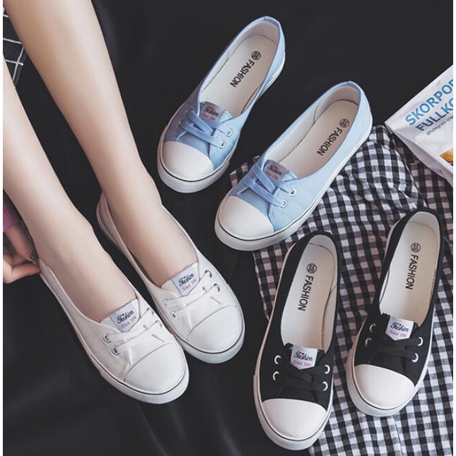 Ladies flat best sale canvas shoes