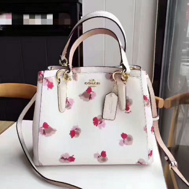 White coach discount purse with flowers