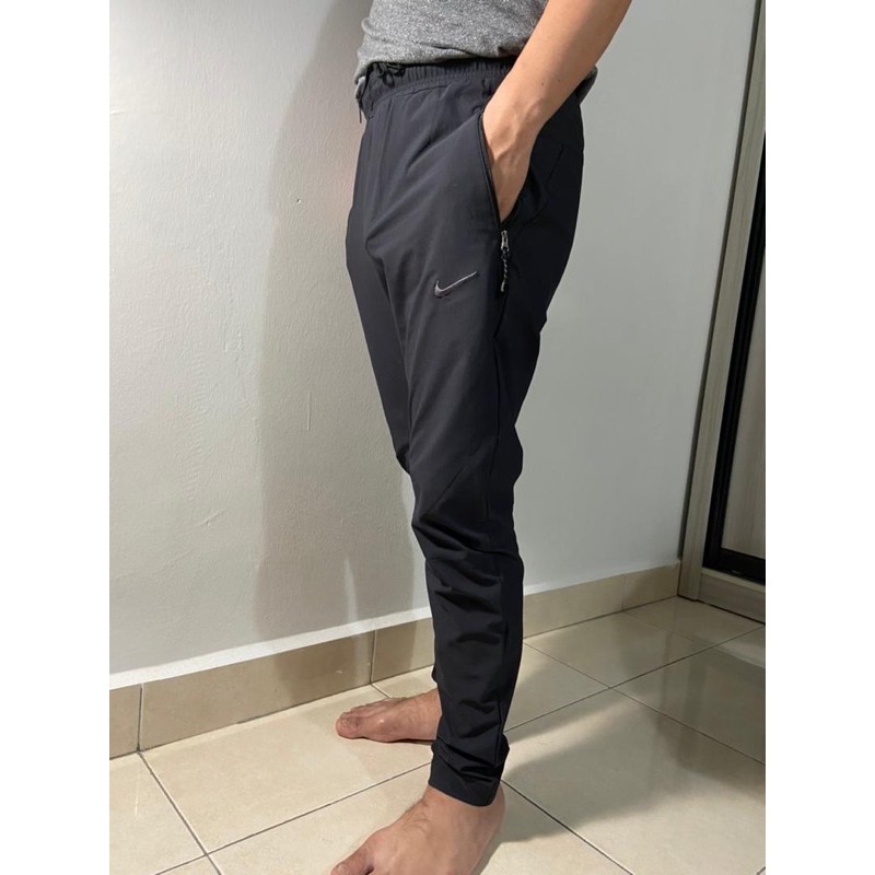 Nike flexible best sale woven track pants