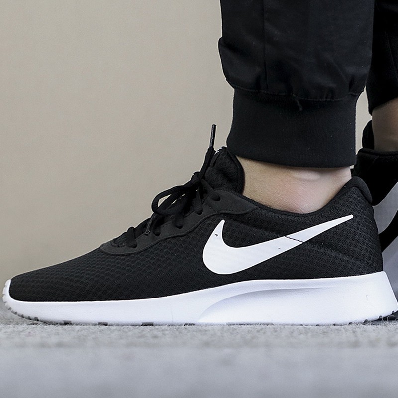 Nike sports shoes black and cheap white