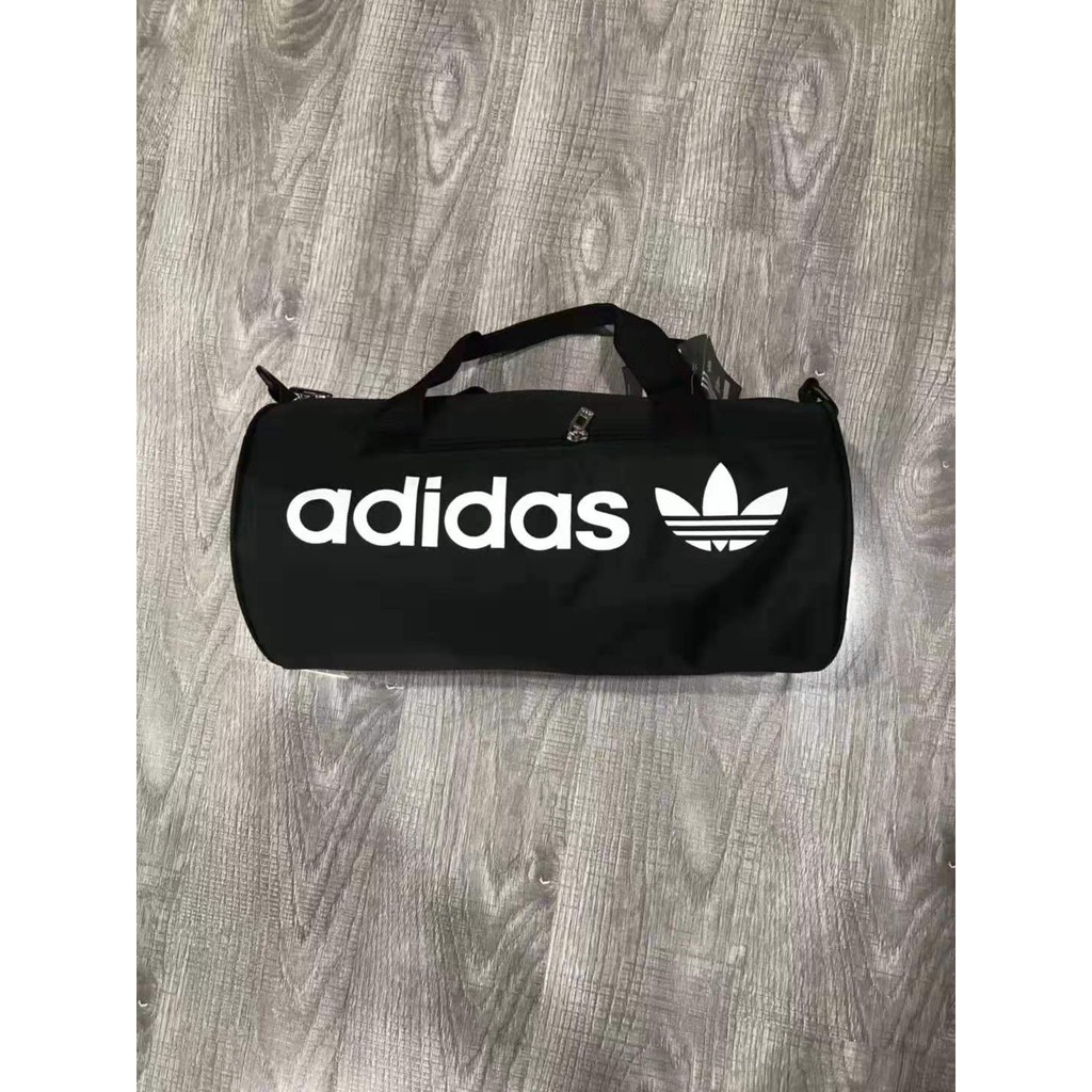 Adidas originals paneled roll hotsell duffel bag