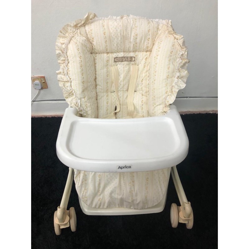 Aprica swing best sale high chair