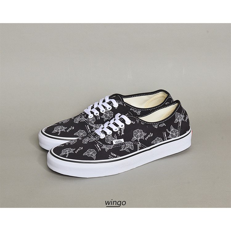 Vans black and white with clearance writing