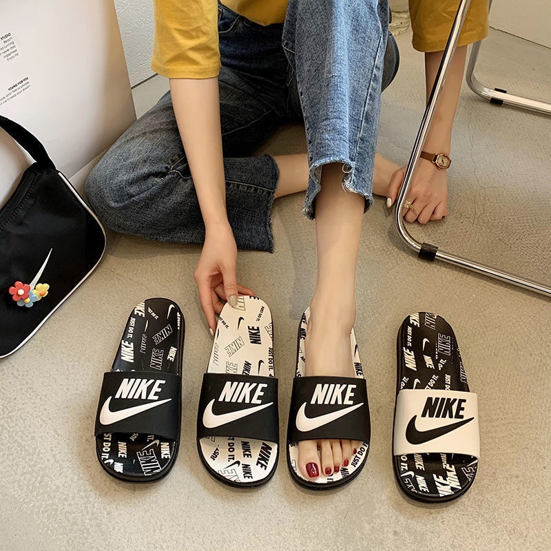 Couple store slippers nike