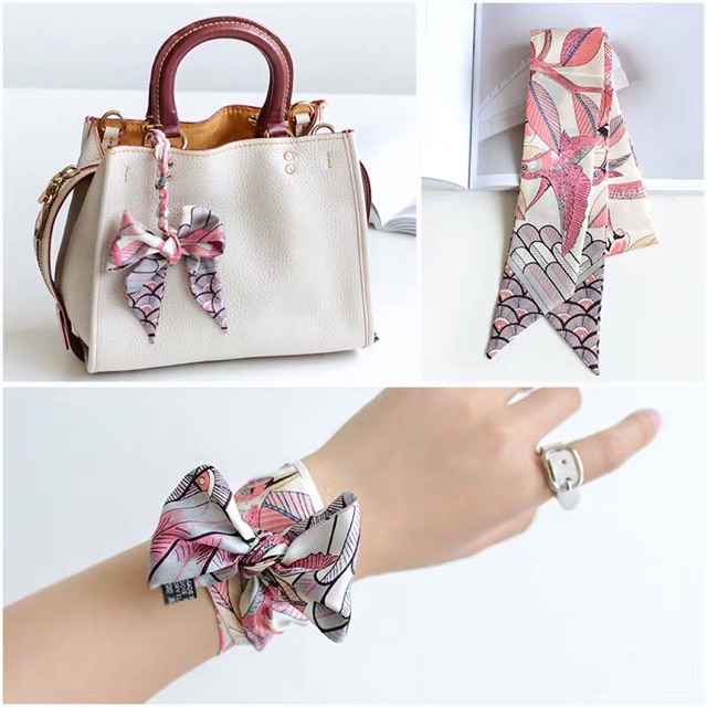 How to tie a beautiful bow on a bag with twilly .Accessorizing handbag  handles with twilly. 