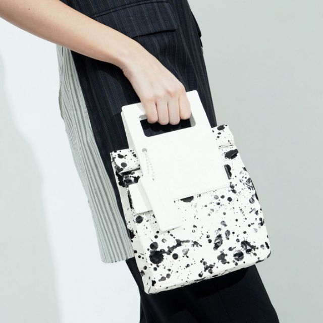 Paper bag clutch deals charles and keith