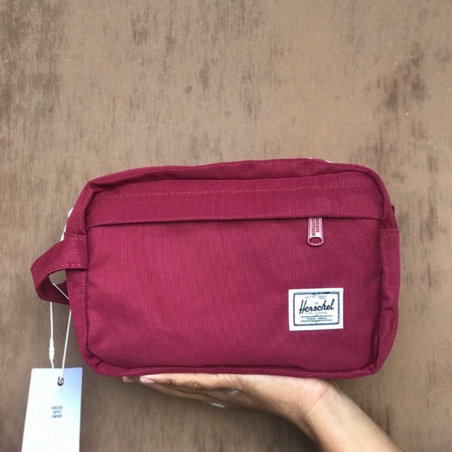 Herschel store clutch bag