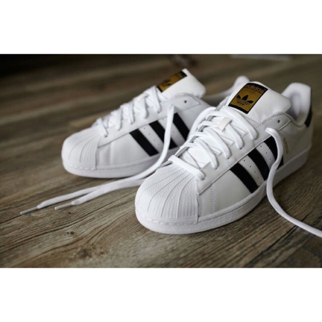 Adidas superstar 2025 gold tag