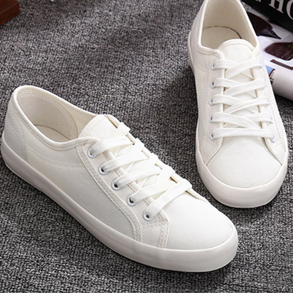 Plain white canvas top sneakers