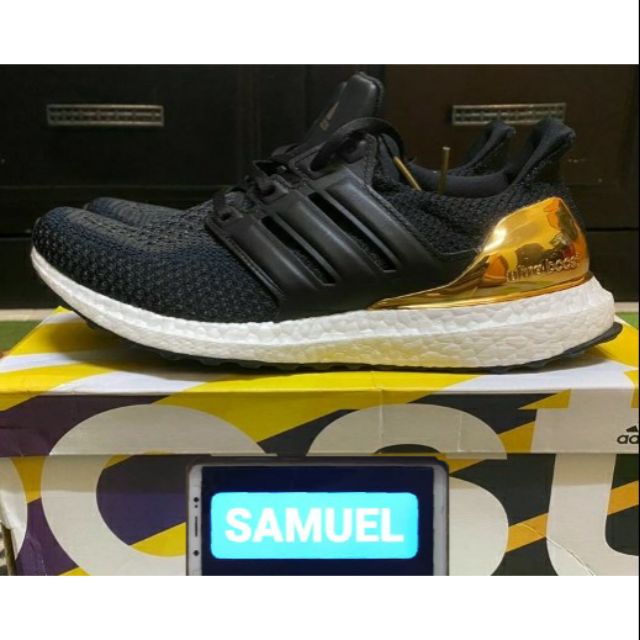 Ultra boost gold clearance medal