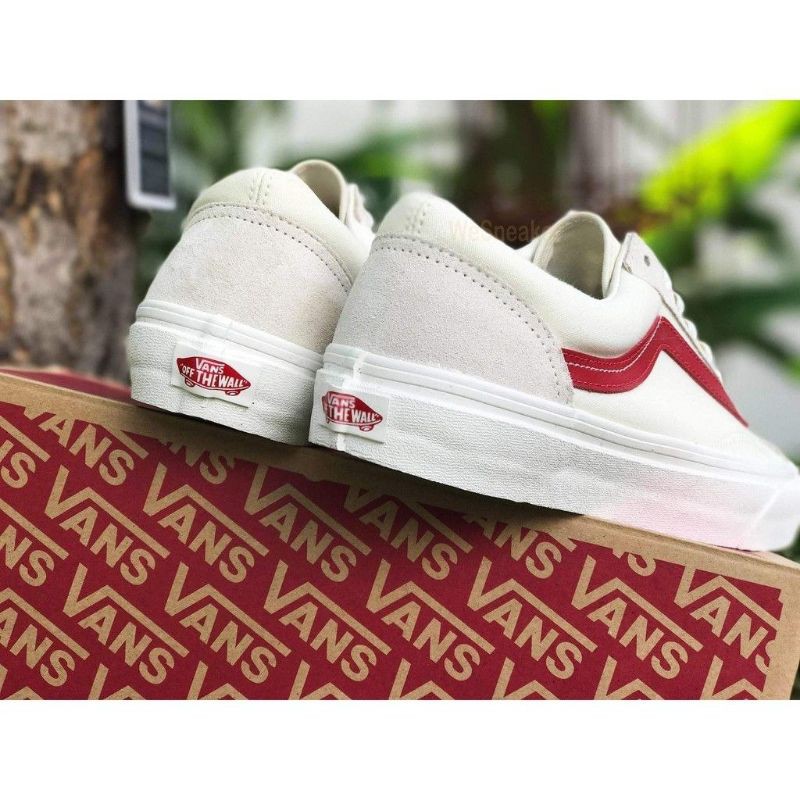 White vans store with red stripe