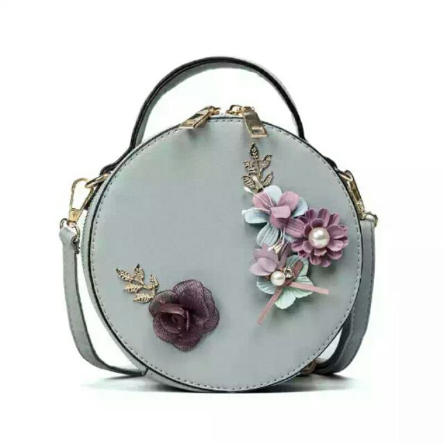 Round shape sling top bag