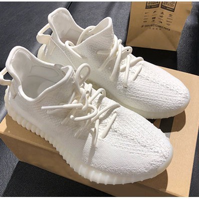 Yeezy triple white hot sale uv light