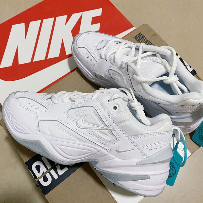 Nike air monarch on sale white