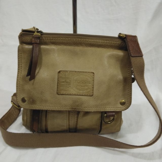 Fossil sling outlet backpack