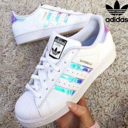 White adidas shoes store with rainbow stripes