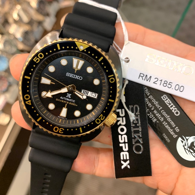 Seiko turtle best sale black and gold