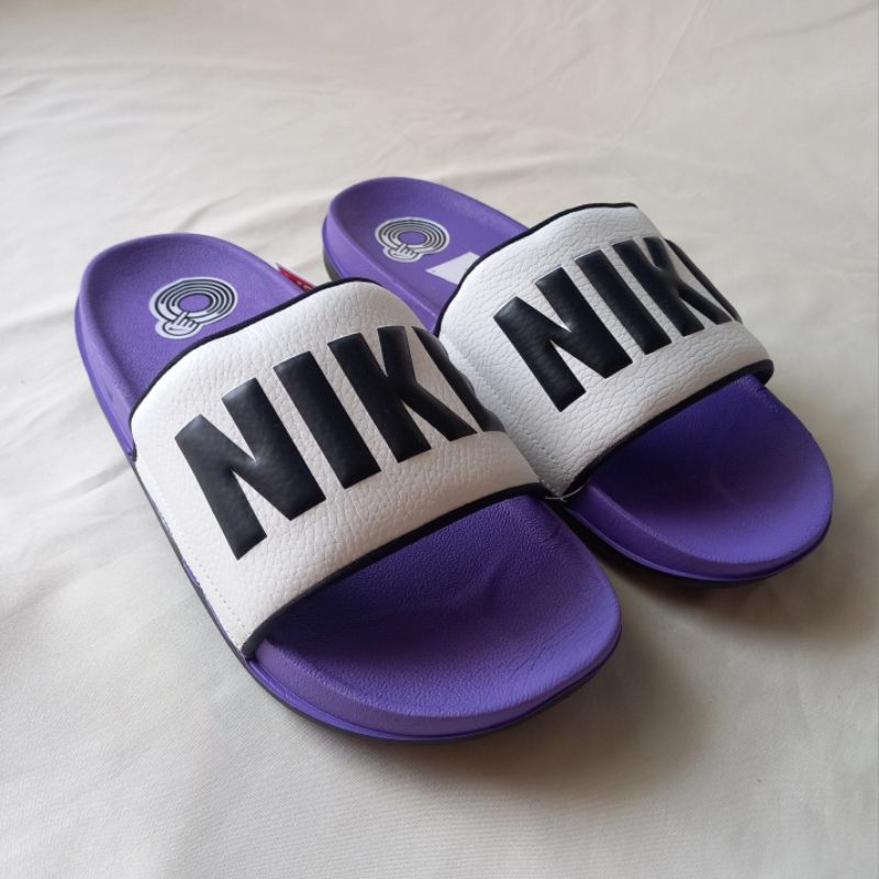 Nike best sale purple slides