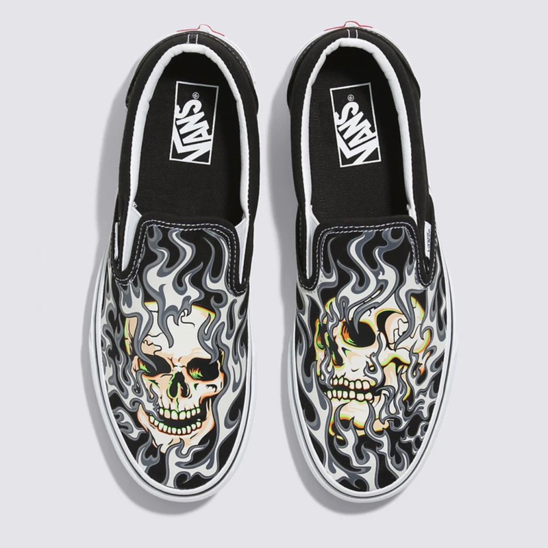 Vans slip on skull on sale shoes