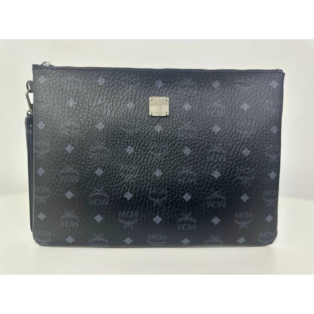 Mcm clutch bag discount men