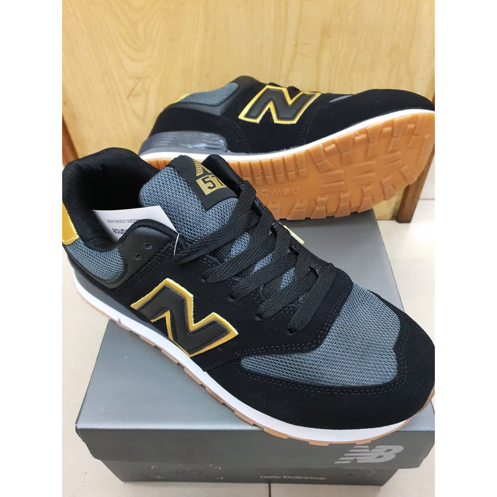 New balance hot sale gold shoes